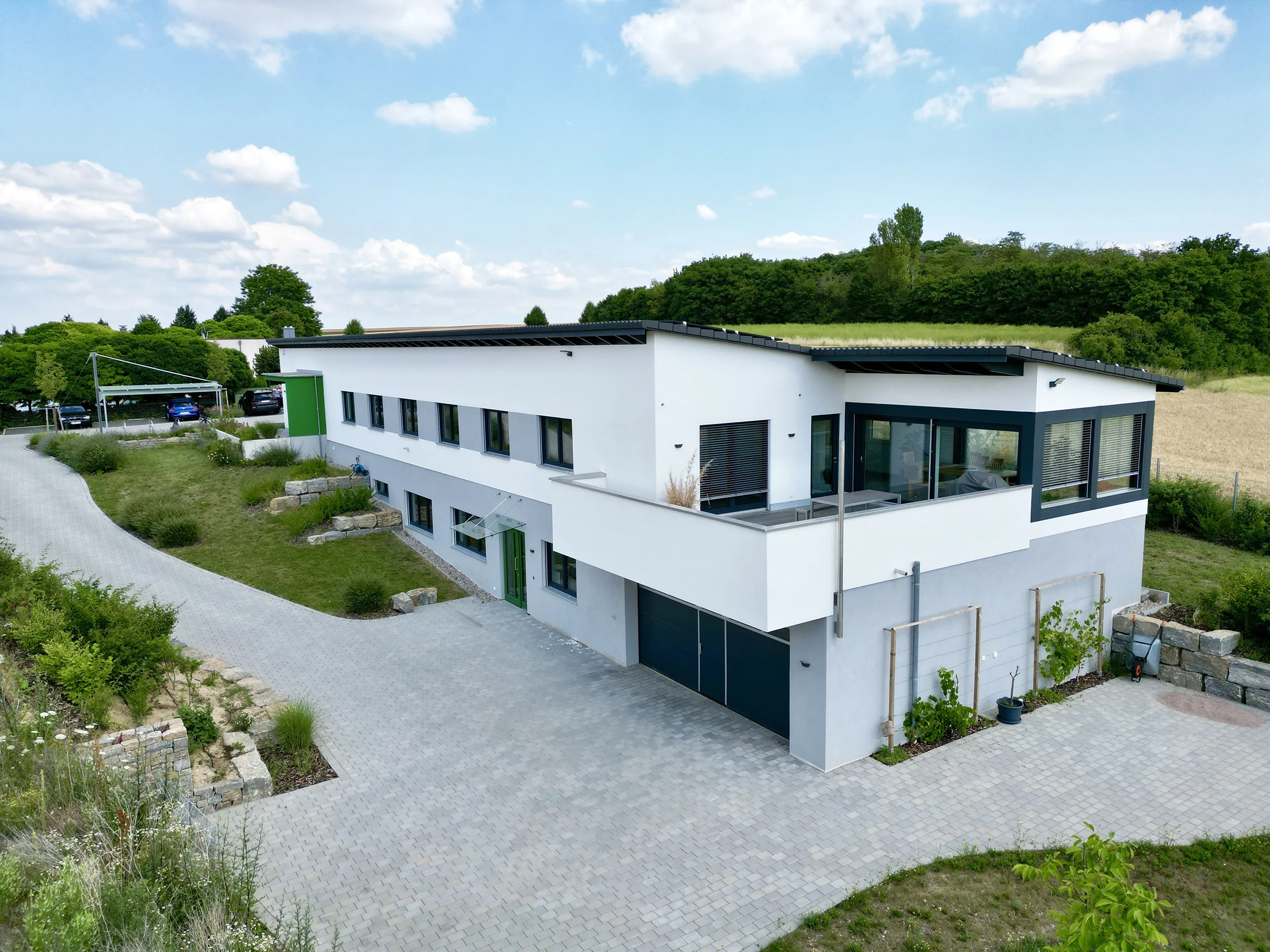 Buero- und Laborgebaeude mit Pultdach von Meisterstueck Haus Seitenansicht 1