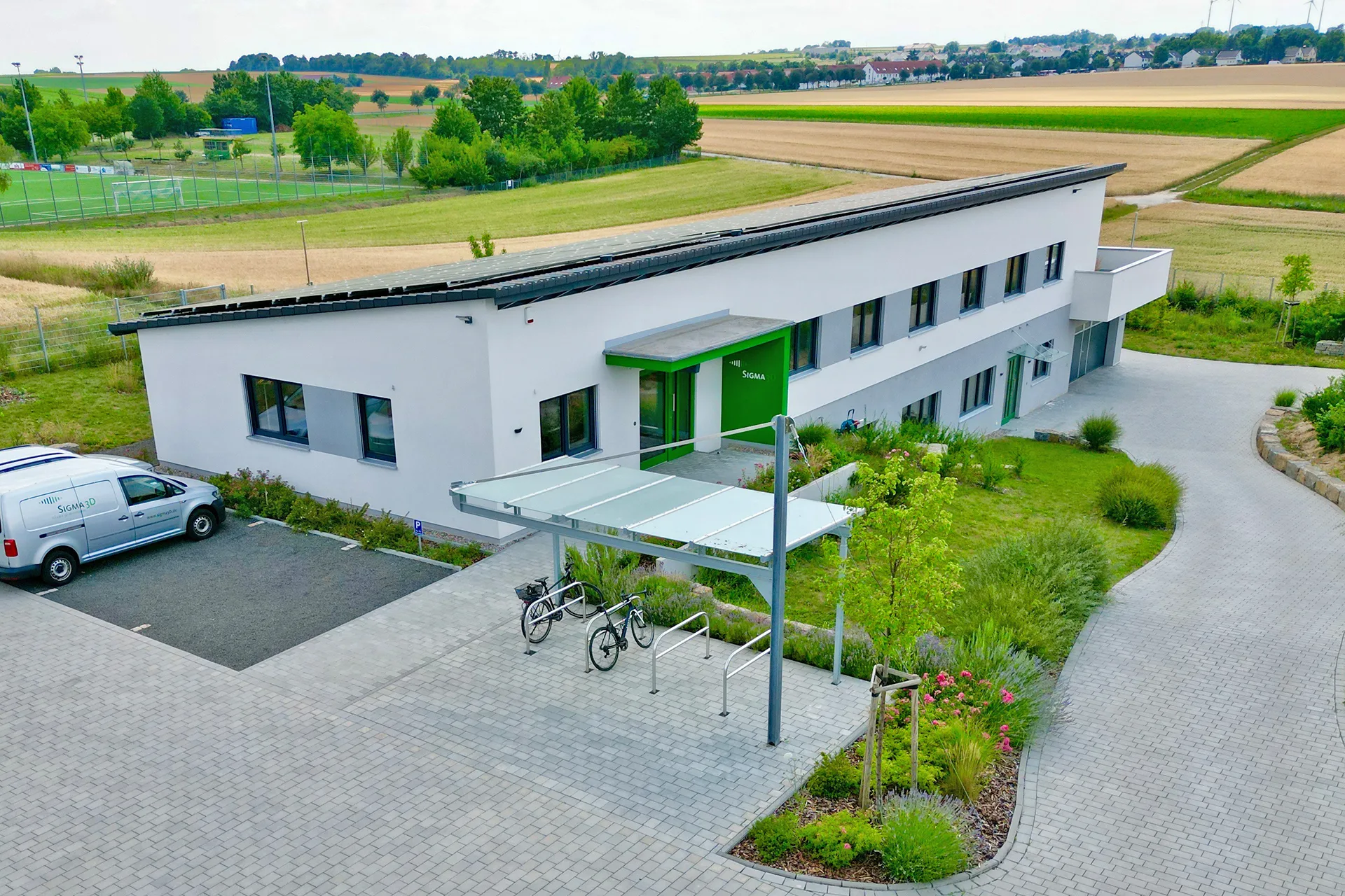 Buero- und Laborgebaeude mit Pultdach von Meisterstueck Haus Seitenansicht 2