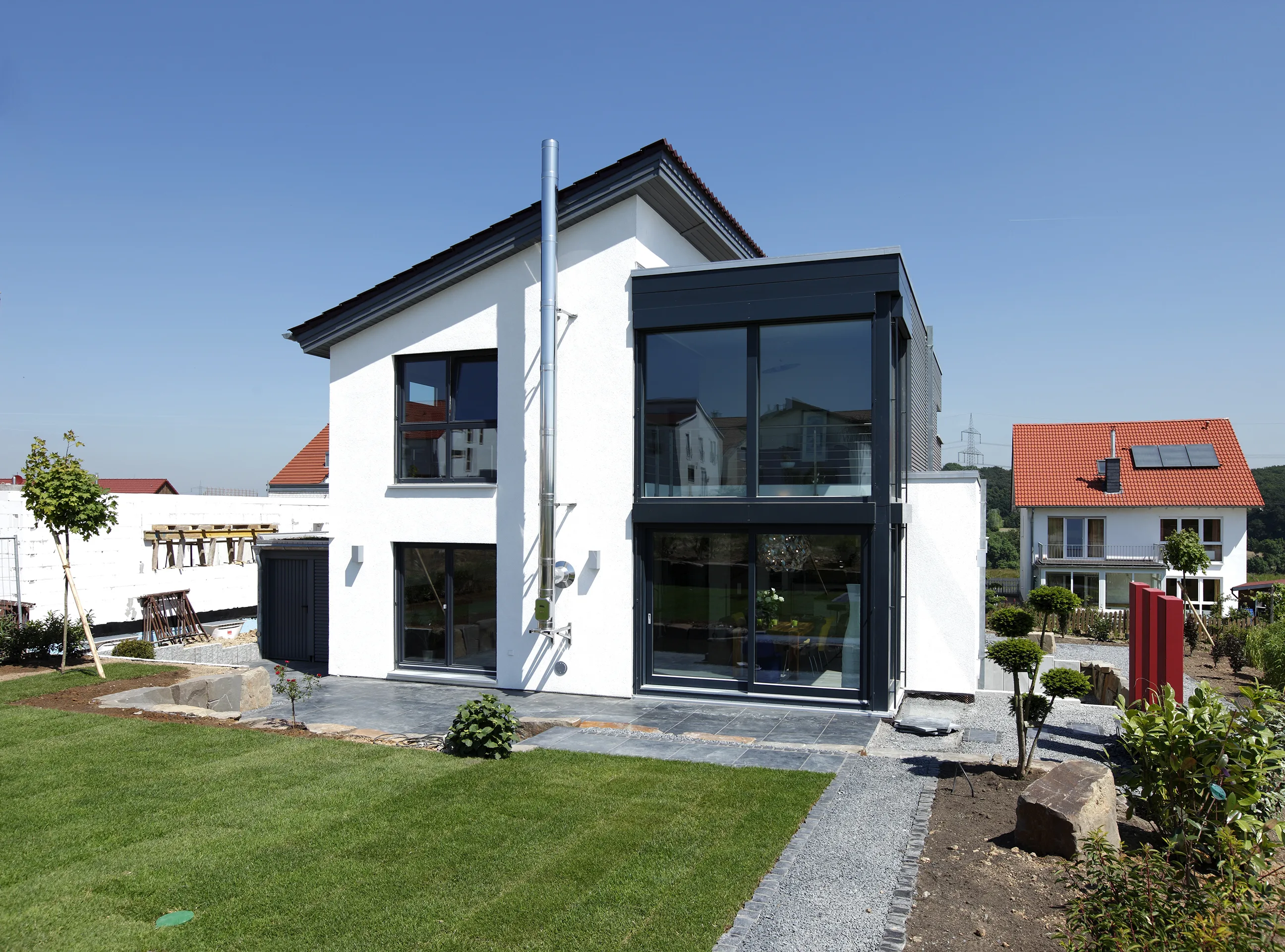 Individuelles Effizienzhaus 55 von Meisterstueck Haus Gartenansicht