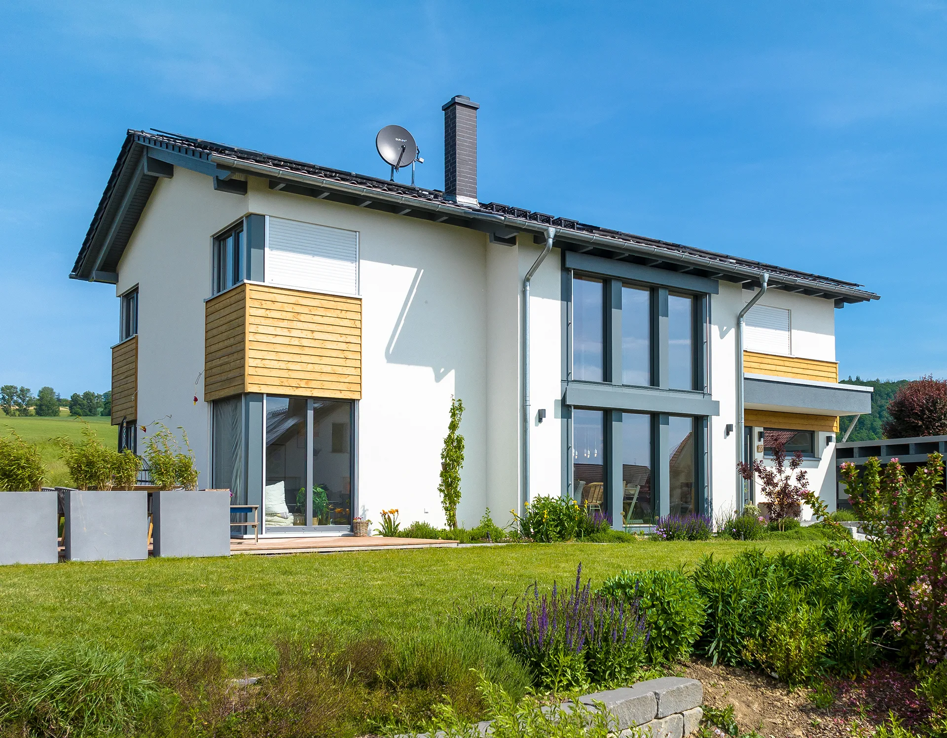 Kubus Familienhaus von Meisterstueck Haus Seitenansicht