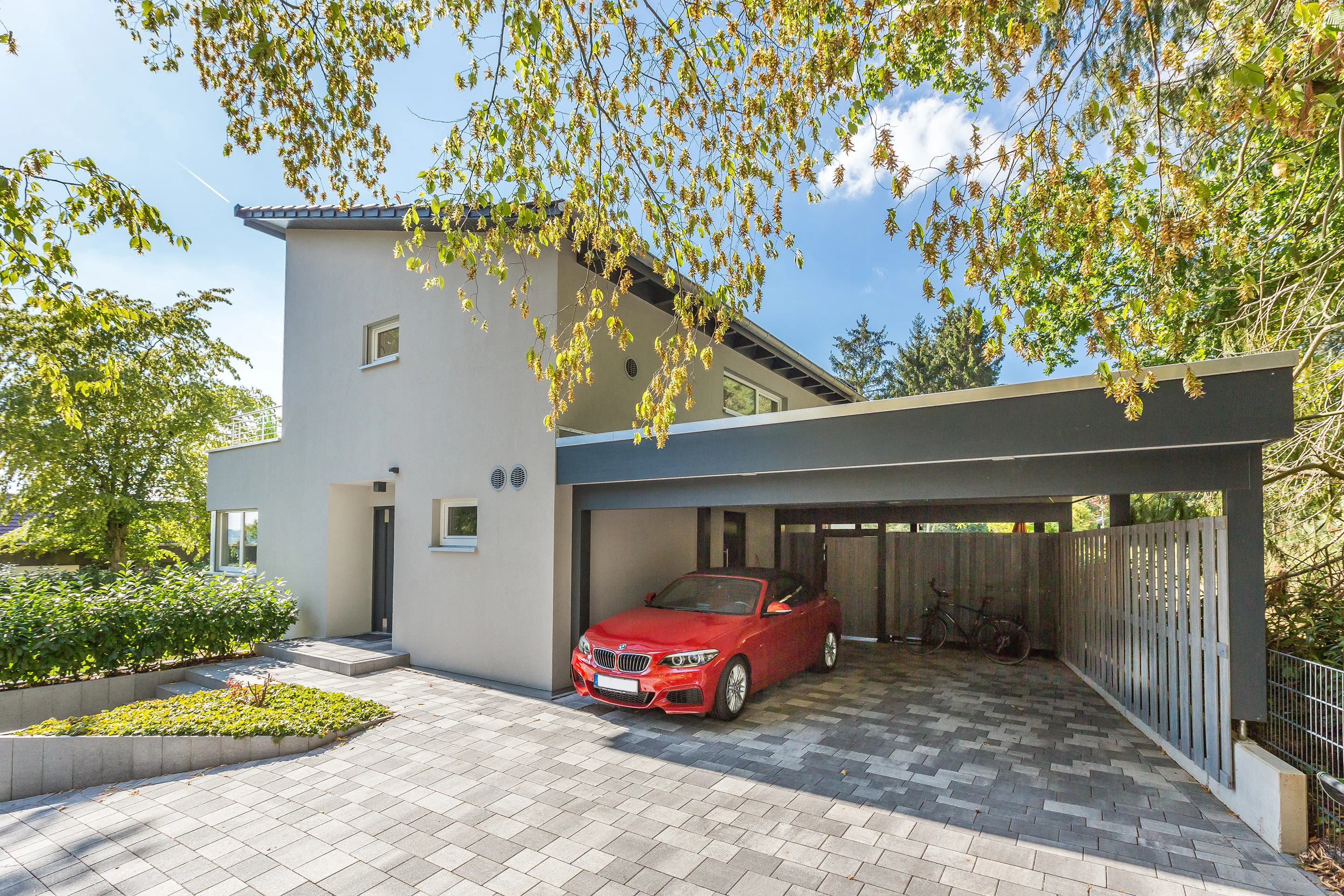 Pultdach mit Staffelgeschoss von Meisterstueck Haus Carport