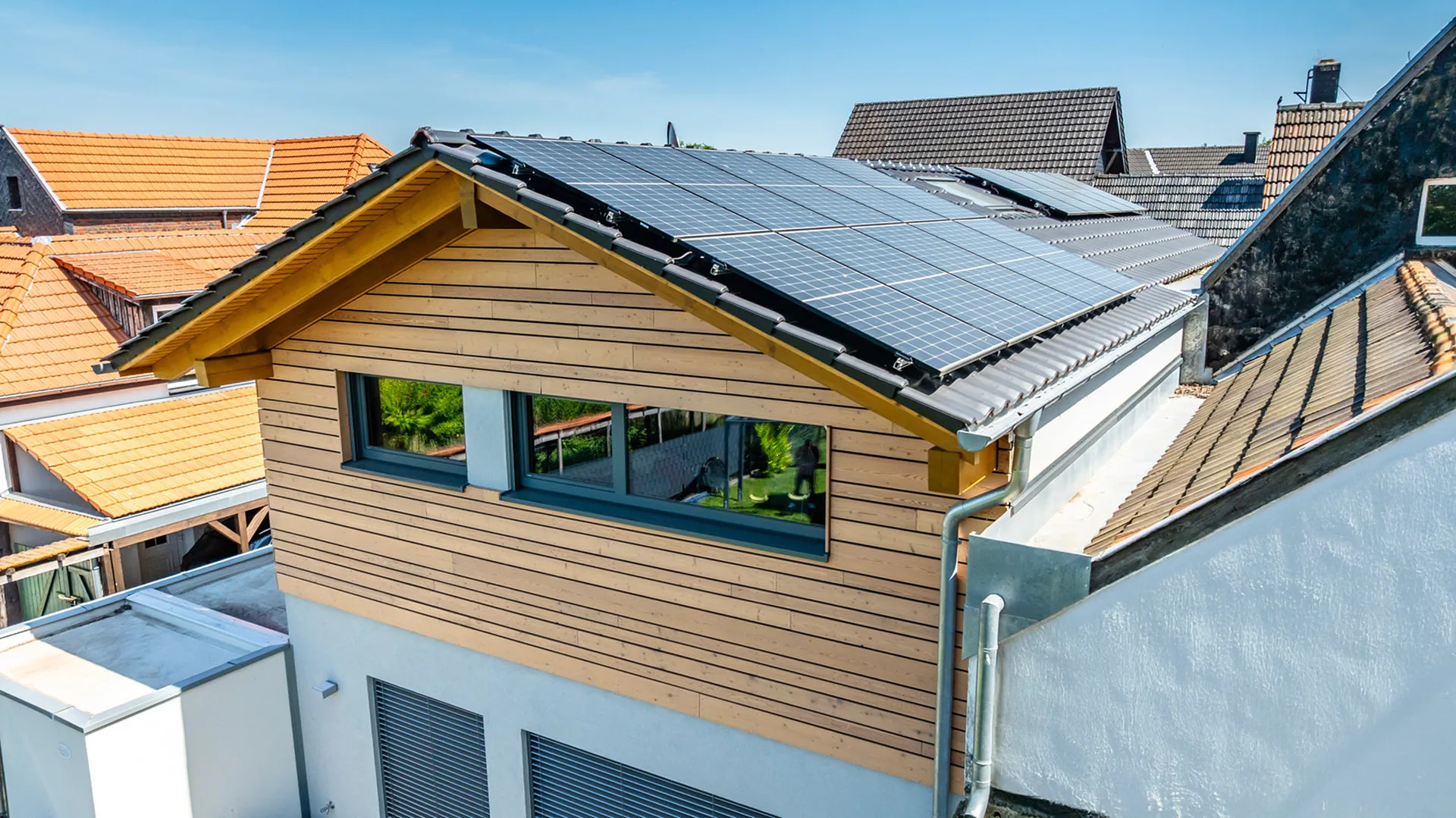 Familien-Traumhaus als Bestandsanbau von Meisterstueck Haus Dach